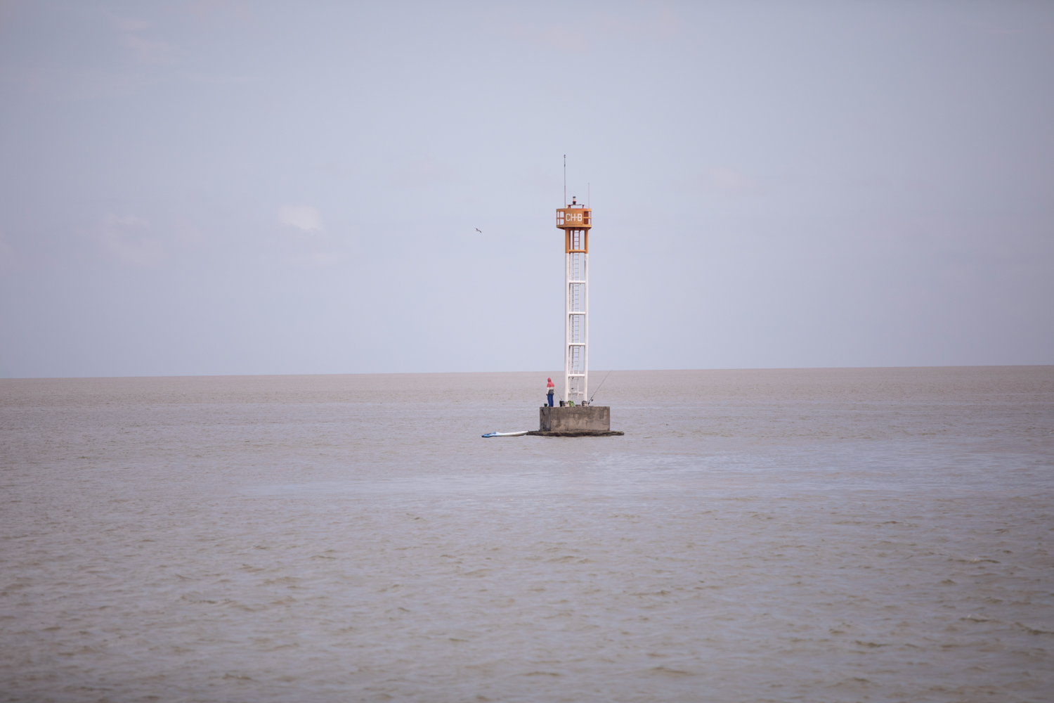 Beacon at sea, Elsewhere Is Here series — photograph by Jo Allaux