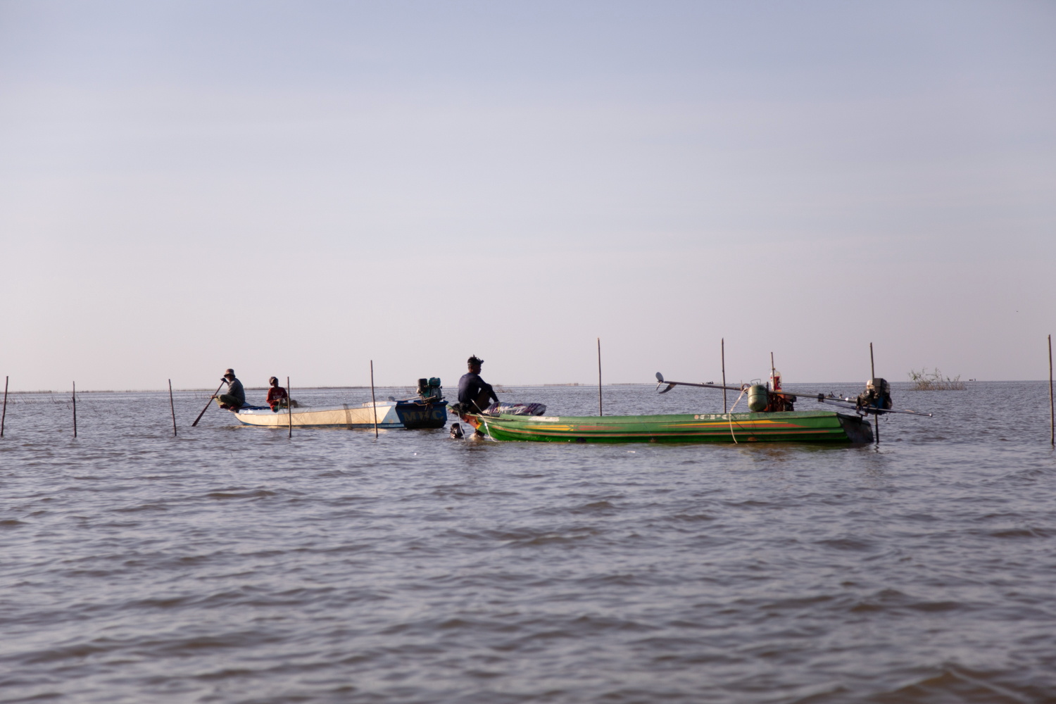 Silhouette on water — fine art photography by Jo Allaux